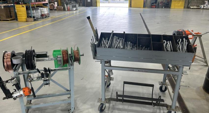 A unique storage cart for material and tools to frame poles in the shop, fabricated by Clint Patterson of Hancock-Wood Electric Cooperative.