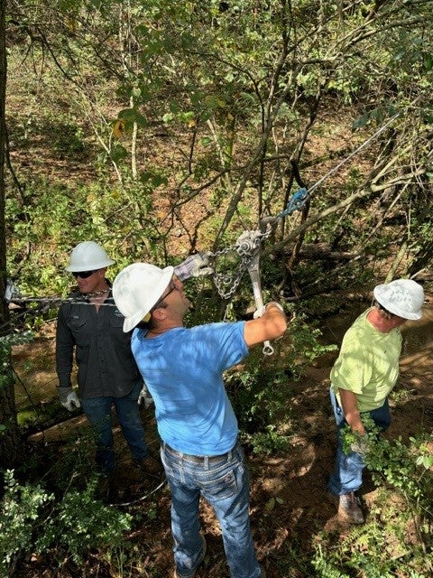 Crews from Midwest Electric in Statesville, NC, assisting Energy United Cooperative