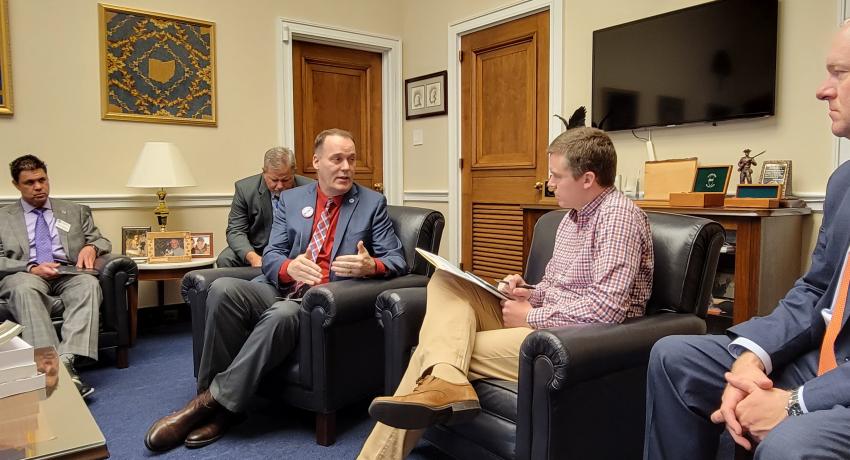 Ed VanHoose leads a discussion on rural Ohio priorities with Mike Davin, Legislative Director for Congressman Bob Latta and cooperative leadership.