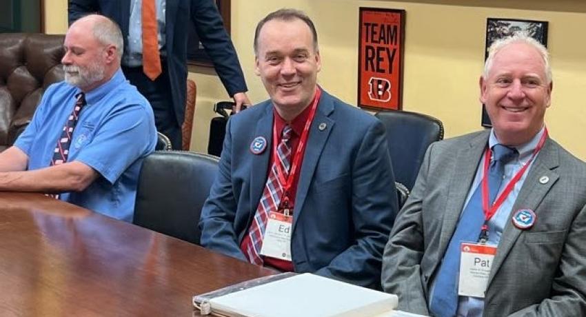 Marc Armstrong (Director, Government Affairs, OEC) and cooperative leaders prepare for a legislative meeting with U.S. Senator Rob Portman.