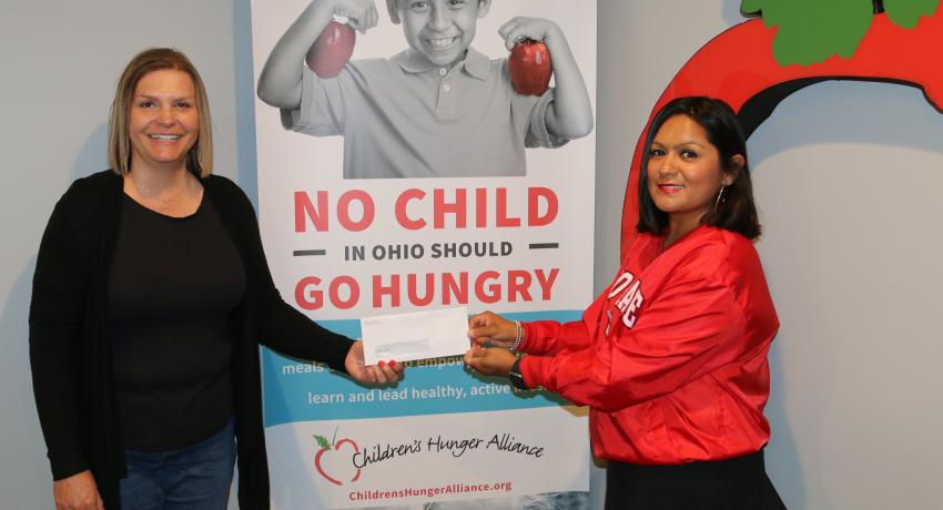 Children's Hunger Alliance in Columbus, Ohio receives a $500 donation from Ohio's Electric Cooperatives