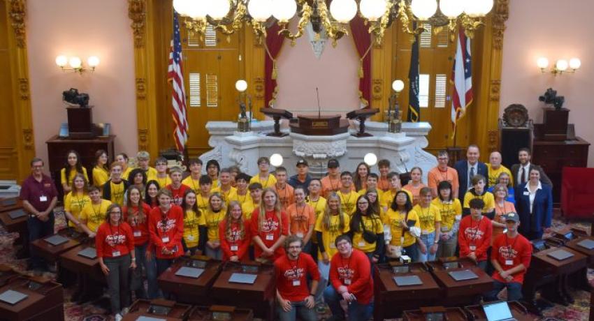 Representative McClain poses with the full group of LMRE, NCE, and Firelands students, board, teachers, and staff.